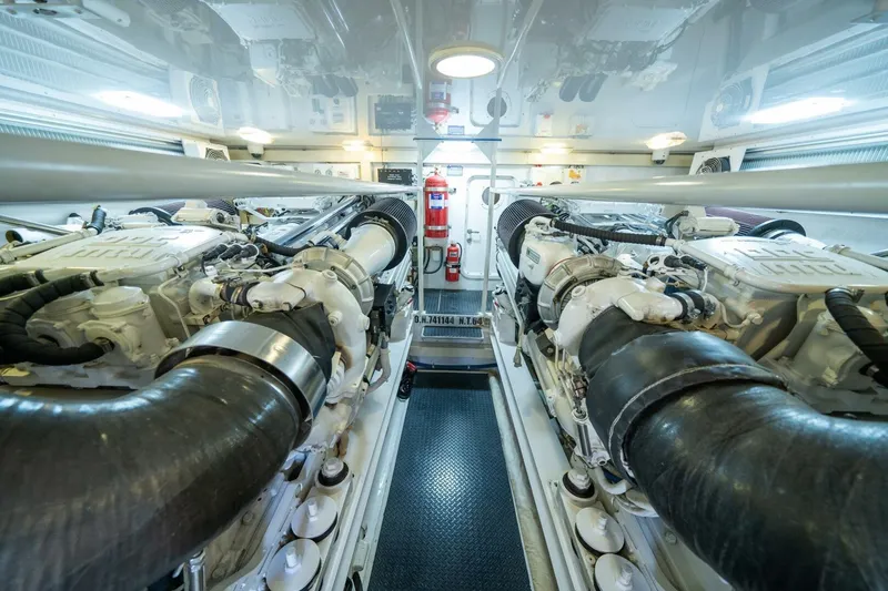 Slide: The Image of Engine room of 2006 Viking 68 Convertible yacht, showcasing dual engines and equipment. - 66