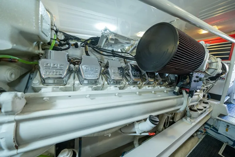 Slide: The Image of Engine room of 2006 Viking 68 Convertible yacht, showcasing powerful machinery and components. - 67