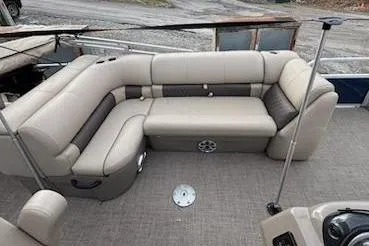 Slide: The Image of 2023 Sun Tracker Fishin' Barge 20 DLX with spacious seating and scenic outdoor view. - 10