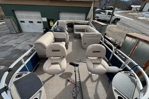 Slide: The Image of 2023 Sun Tracker Fishin' Barge 20 DLX pontoon boat with spacious seating and fishing amenities. - 14