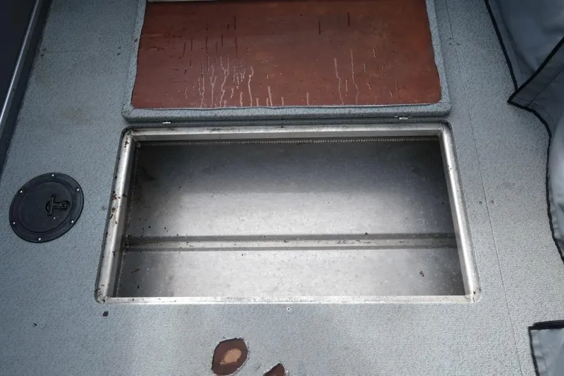 Slide: The Image of Open storage compartment on 2017 North River 21 SEAHAWK boat deck. - 20