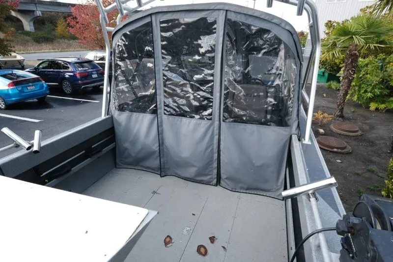 Slide: The Image of 2017 North River 21 SEAHAWK boat with covered cabin in parking lot. - 7