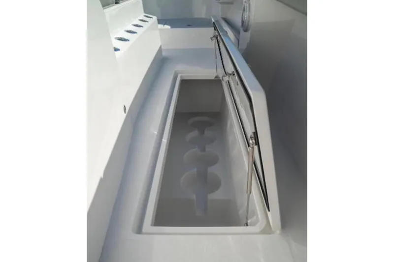 Slide: The Image of 2024 Front Runner 37 Catamaran storage compartment with open lid and sleek design. - 102