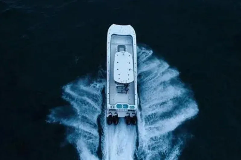 Slide: The Image of Aerial view of 2024 Front Runner 37 Catamaran cruising on open water. - 112