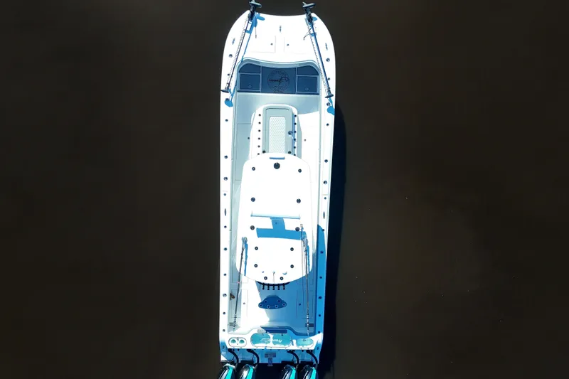 Slide: The Image of Aerial view of 2024 Front Runner 37 Catamaran on dark water. - 46