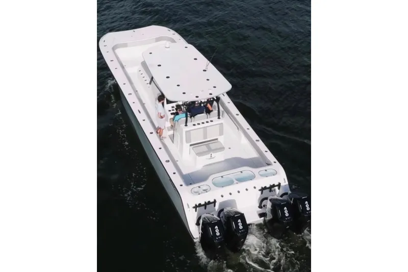 Slide: The Image of 2024 Front Runner 37 Catamaran cruising on a sunny day, showcasing sleek design and performance. - 8