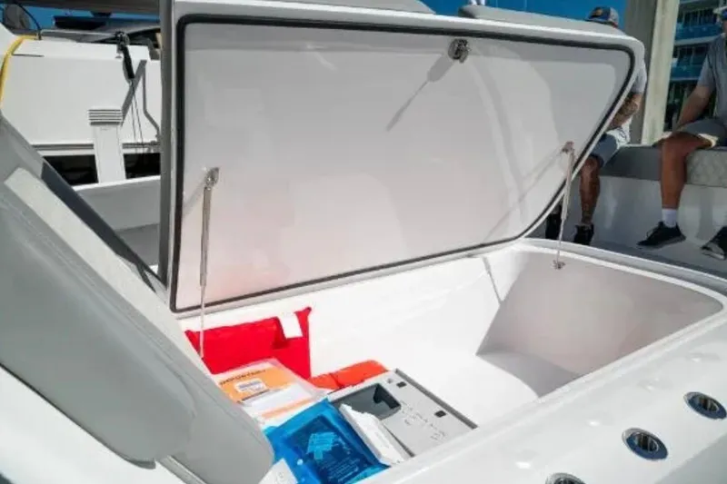 Slide: The Image of Open storage compartment on 2024 Front Runner 37 Catamaran, showcasing spacious interior. - 85