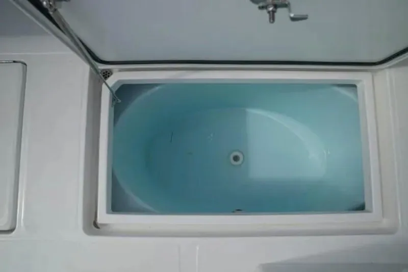 Slide: The Image of Livewell on 2024 Front Runner 37 Catamaran, featuring a clean, white design. - 99