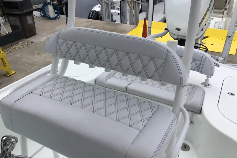 Slide: The Image of 2020 Yellowfin 24 Bay CE boat with diamond-stitched white seating. - 33