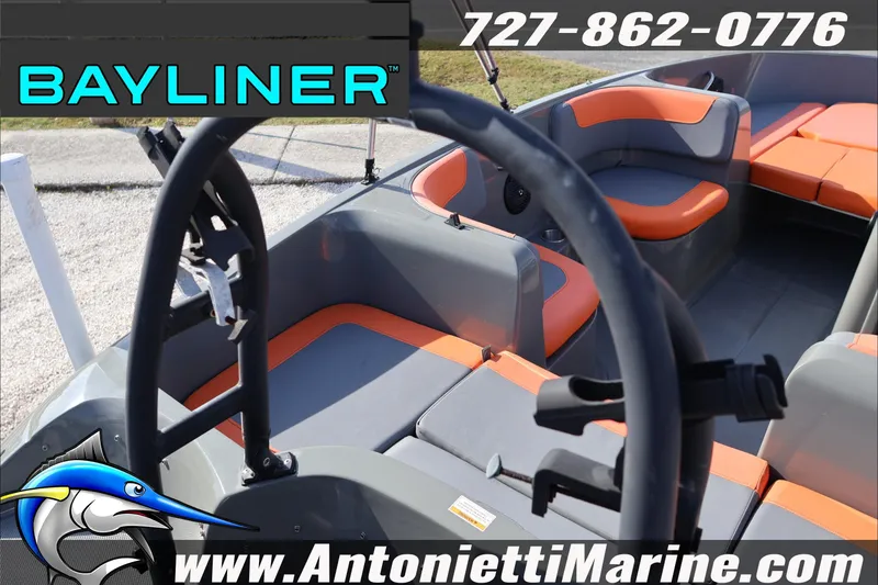 Slide: The Image of 2020 Bayliner Element E16 boat interior with orange and gray seating, Antonietti Marine branding. - 11