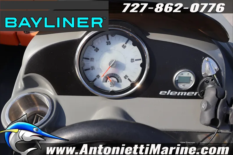 Slide: The Image of Dashboard of 2020 Bayliner Element E16 boat with speedometer and controls. - 14