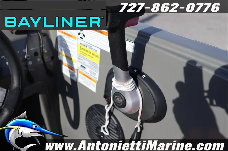 Slide: The Image of 2020 Bayliner Element E16 boat throttle control with contact information and logo. - 15