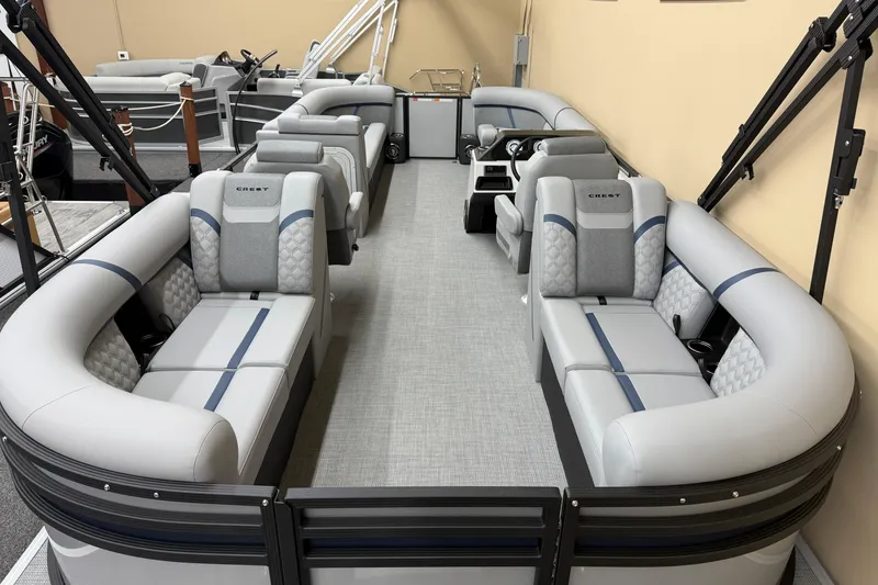 Slide: The Image of 2026 Crest Conquest 230 SLC pontoon boat with luxurious seating and modern design. - 13