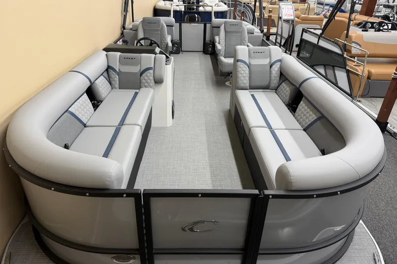 Slide: The Image of 2026 Crest Conquest 230 SLC pontoon boat with spacious seating and modern design. - 2