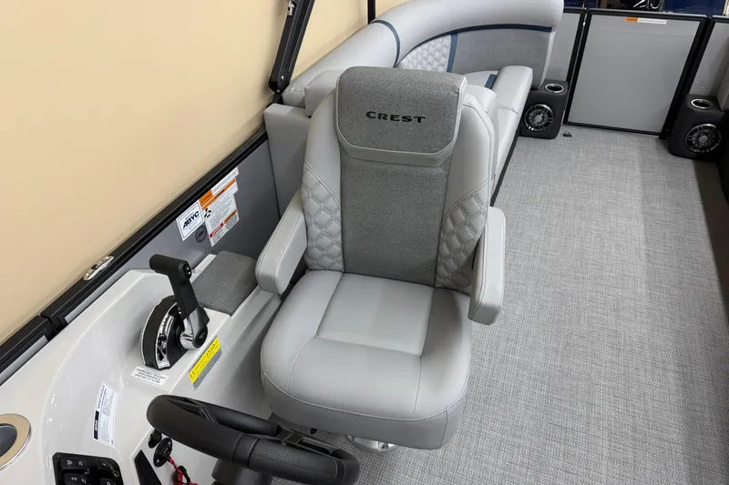 Slide: The Image of Captain's chair in 2026 Crest Conquest 230 SLC pontoon boat interior. - 6