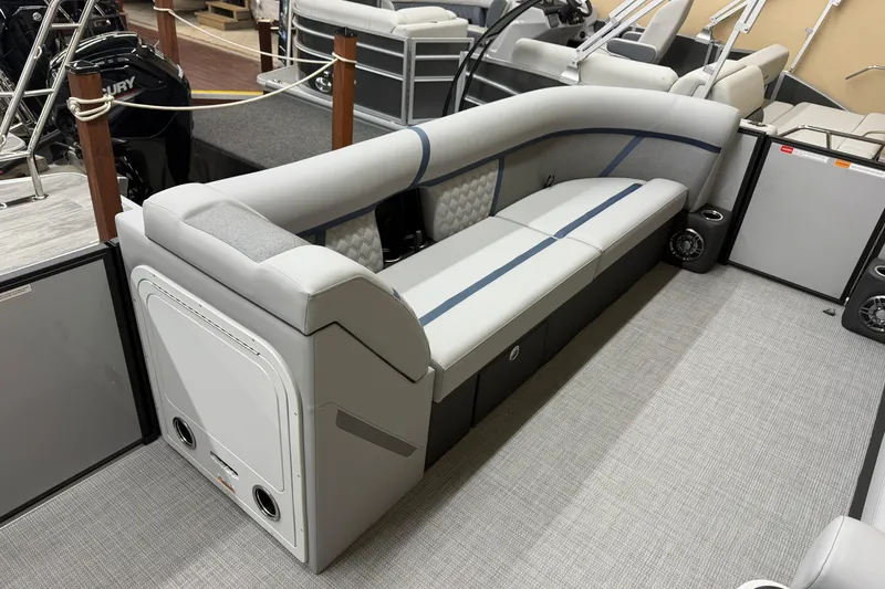 Slide: The Image of 2026 Crest Conquest 230 SLC boat interior with sleek seating and modern design. - 9