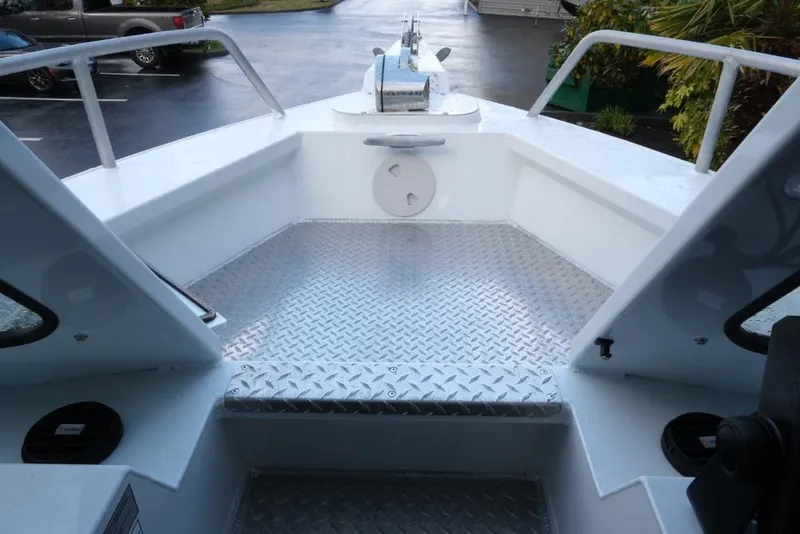 Slide: The Image of 2023 Hewescraft 270 Alaskan ET HT boat deck with diamond plate flooring. - 22