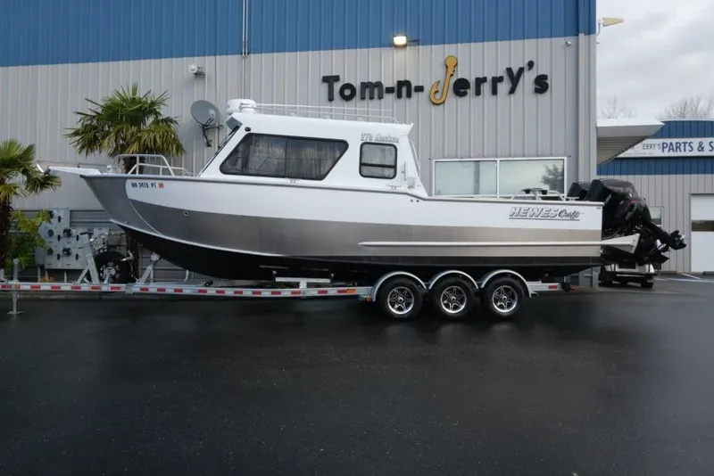 Slide: The Image of 2023 Hewescraft 270 Alaskan ET HT boat on trailer outside dealership. - 4