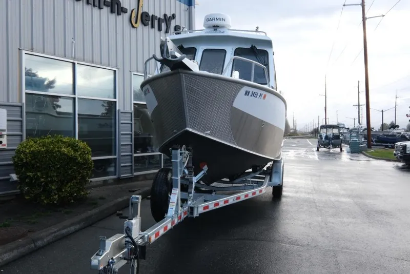 Slide: The Image of 2023 Hewescraft 270 Alaskan ET HT boat on trailer outside dealership. - 5