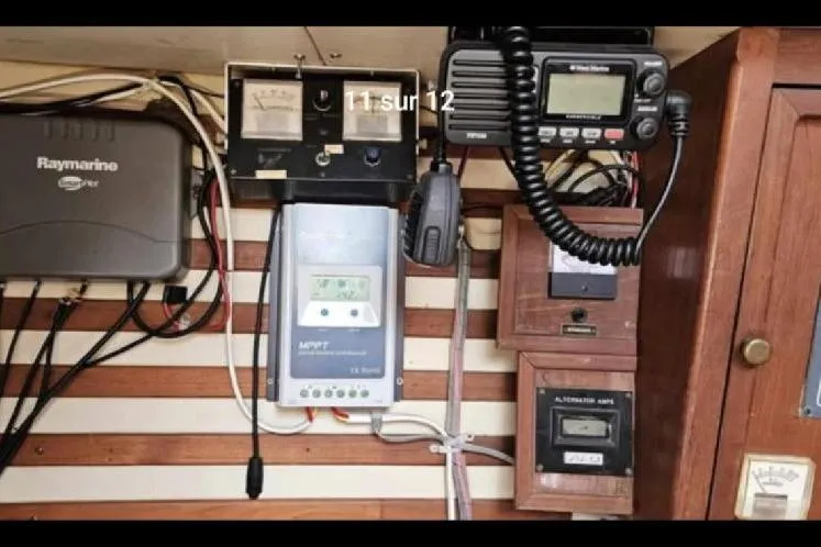 Slide: The Image of Electrical panel of 1984 Endeavour 33 sailboat with navigation and communication equipment. - 15