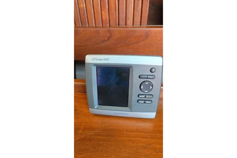 Slide: The Image of Garmin GPSmap 440 device on wooden surface, Endeavour 33, 1984 model. - 17