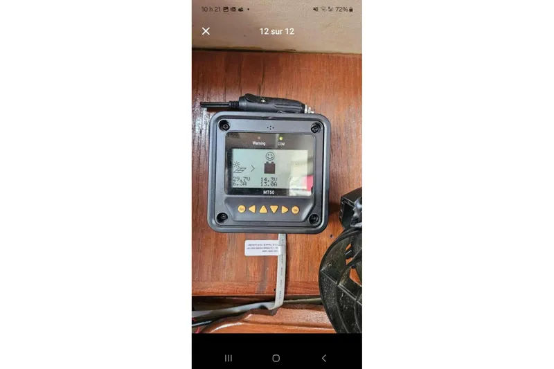 Slide: The Image of Digital display on 1984 Endeavour 33 boat, showing electrical system status. - 30