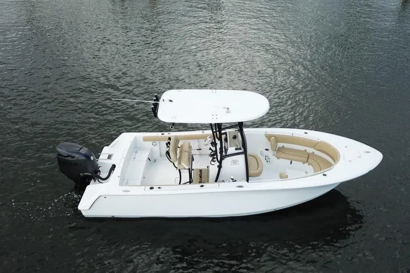 Slide: The Image of 2019 Sportsman Heritage 231 Center Console boat on calm water. - 10