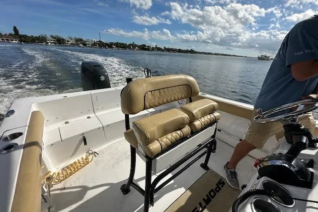 Slide: The Image of 2019 Sportsman Heritage 231 Center Console boat cruising on a sunny day. - 9