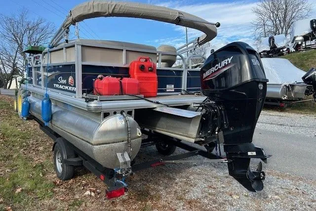 Slide: The Image of 2023 Sun Tracker Bass Buggy 16 XL Select pontoon boat with Mercury outboard motor. - 4