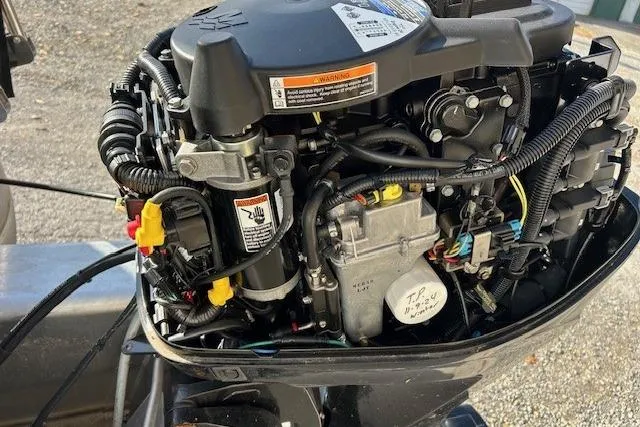 Slide: The Image of 2023 Sun Tracker Bass Buggy 16 XL Select outboard motor, detailed view. - 6