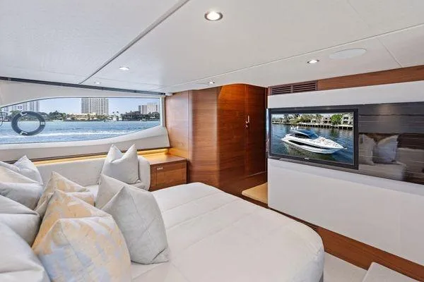 Slide: The Image of Luxurious interior of 2020 Princess V55 yacht with modern decor and waterfront view. - 36