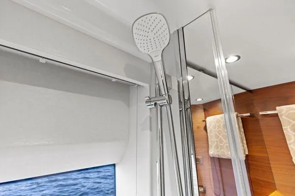 Slide: The Image of Luxury yacht Princess V55 2020 bathroom with modern shower and ocean view. - 44