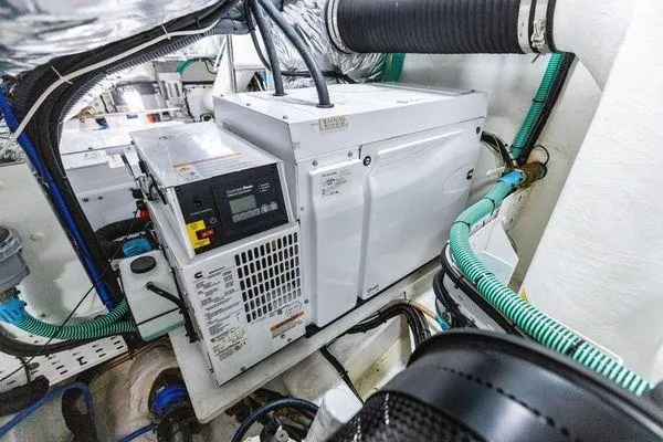 Slide: The Image of Engine room of 2020 Princess V55 yacht with generator and wiring. - 47