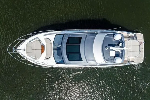 Slide: The Image of Aerial view of 2020 Princess V55 yacht on calm water. - 6