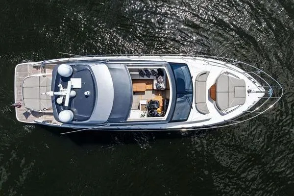 Slide: The Image of Aerial view of 2020 Princess V55 yacht cruising on water. - 7