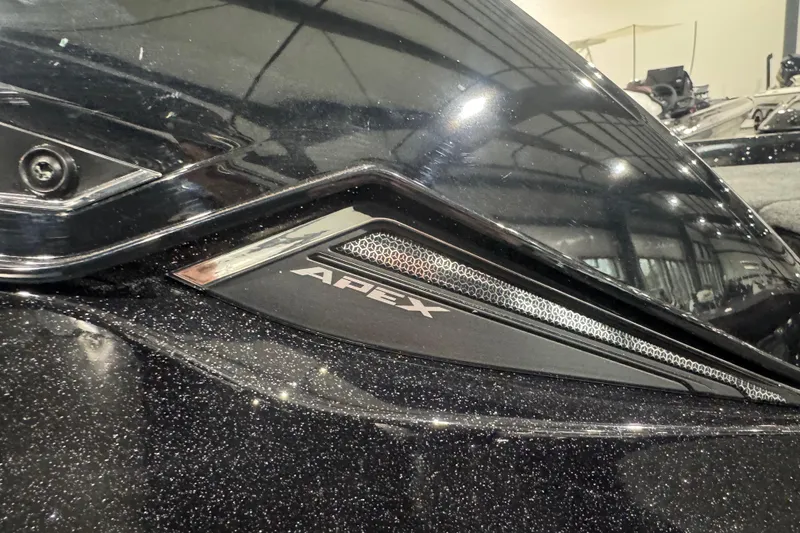 Slide: The Image of 2026 Skeeter FXR20 Apex boat detail with sleek black finish and modern design. - 14
