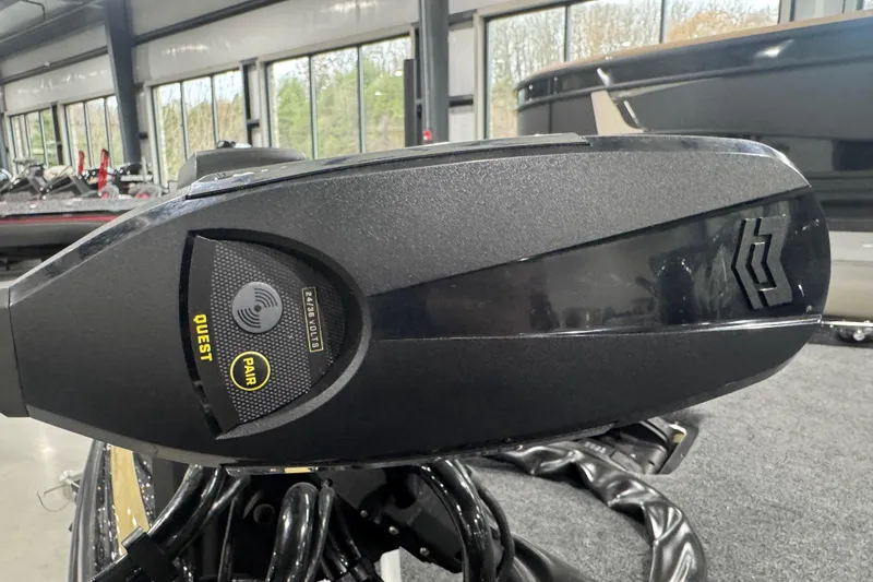 Slide: The Image of 2026 Skeeter FXR20 Apex boat motor in showroom, featuring Quest and Pair technology. - 22