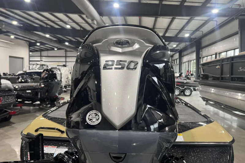 Slide: The Image of 2026 Skeeter FXR20 Apex boat engine, 250 horsepower, in a showroom setting. - 29