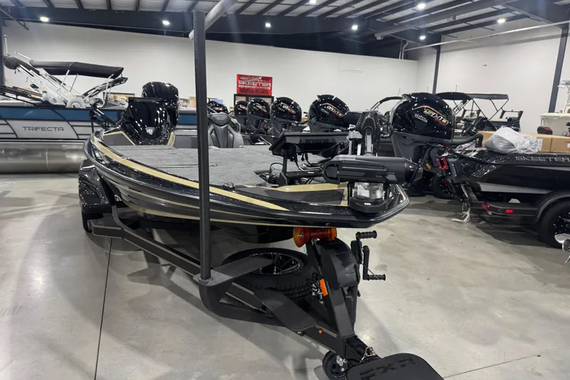 Slide: The Image of 2026 Skeeter FXR20 Apex boat in showroom, featuring sleek design and advanced equipment. - 30