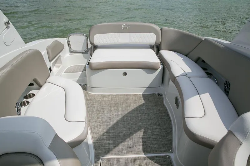 Slide: The Image of 2026 Crownline Eclipse E255 boat interior with plush seating and elegant design. - 2