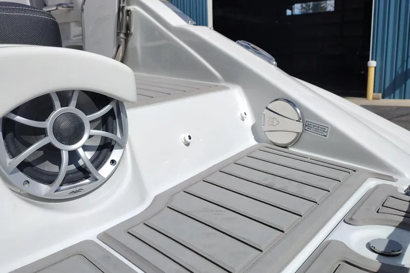 Slide: The Image of 2026 Crownline Eclipse E255 boat deck with speaker and non-slip flooring. - 31