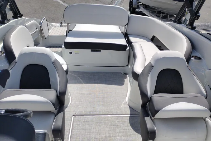 Slide: The Image of 2026 Crownline Eclipse E255 boat interior with luxurious seating and modern design. - 37