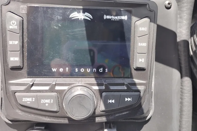 Slide: The Image of Wet Sounds audio system on 2026 Crownline Eclipse E255 boat dashboard. - 50