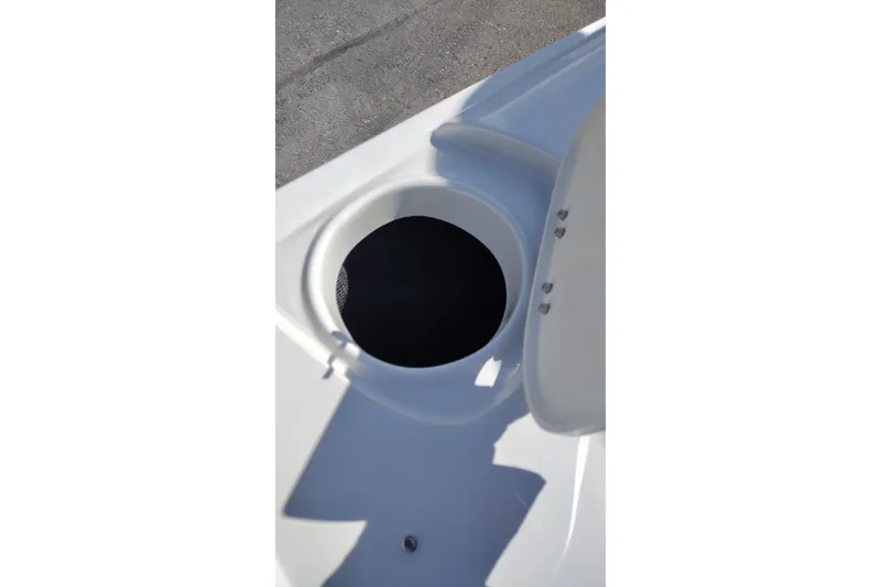 Slide: The Image of Open storage compartment on 2026 Crownline Eclipse E255 boat deck. - 59