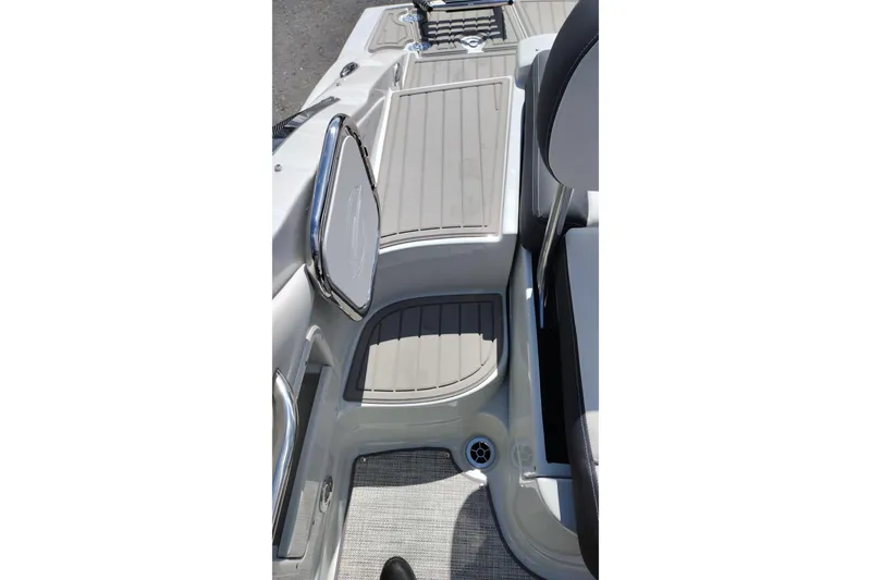 Slide: The Image of 2026 Crownline Eclipse E255 boat interior with sleek seating and modern design. - 64