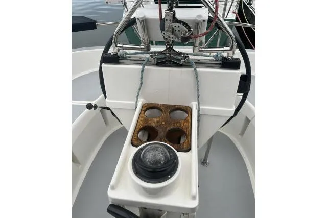 Slide: The Image of Cockpit of 1995 Hunter 336 sailboat with compass and cup holders. - 15