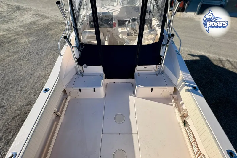 Slide: The Image of 2008 Grady-White Gulfstream 232 boat deck with seating and steering console. - 14