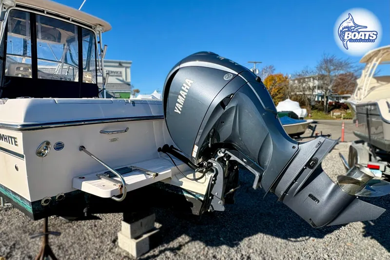 Slide: The Image of 2008 Grady-White Gulfstream 232 boat with Yamaha outboard motor, displayed outdoors. - 16