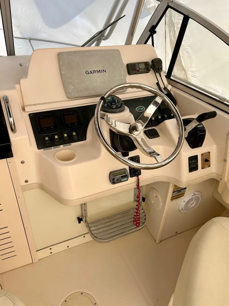 Slide: The Image of 2008 Grady-White 232 Gulfstream WA boat helm with Garmin navigation system. - 17