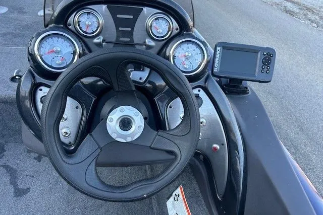 Slide: The Image of 2020 Tracker Pro Team 175 TF dashboard with steering wheel and gauges. - 10